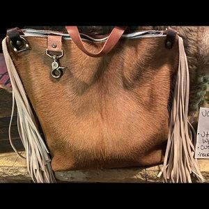 Jill’s Homestead hair on hide backpack with fringe -handmade in Iowa